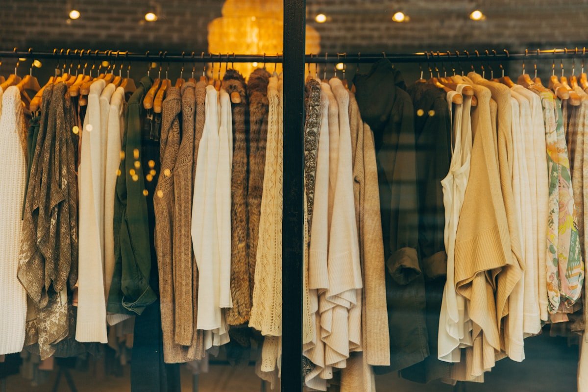 Rack of clothing in a fashion store using a Shopify theme