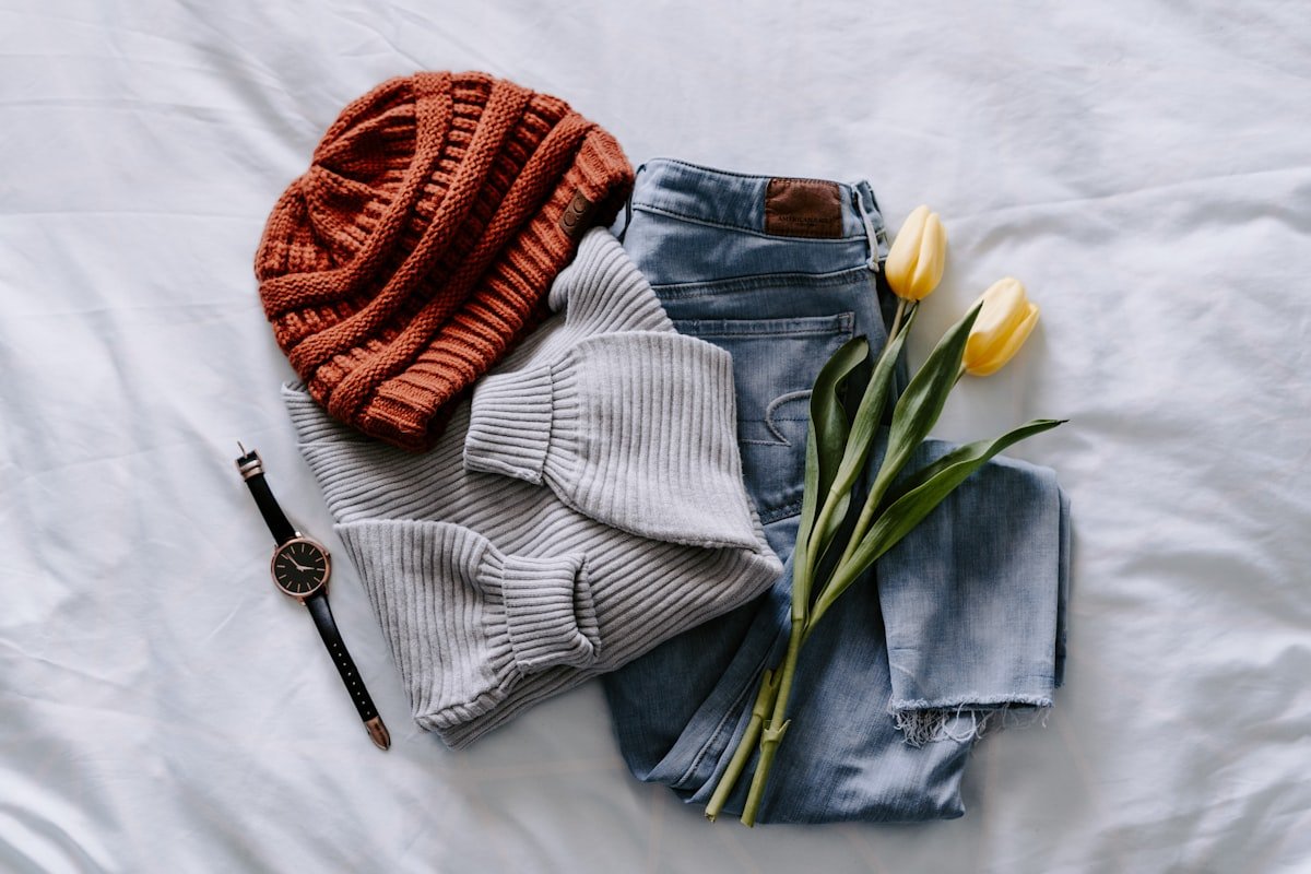 Folded clothing flat-lay — plan your product imagery before choosing a theme